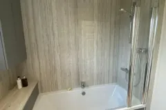 Main-bathroom-with-bath-and-shower-screen-1-jpg