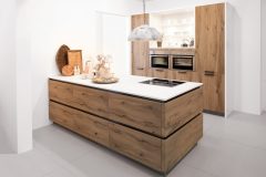 Rustic wooden German kitchen with quartz tabletop surface