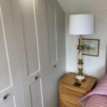 Fitted Bedroom Wardrobes with Angle Doors - Light Grey Painted